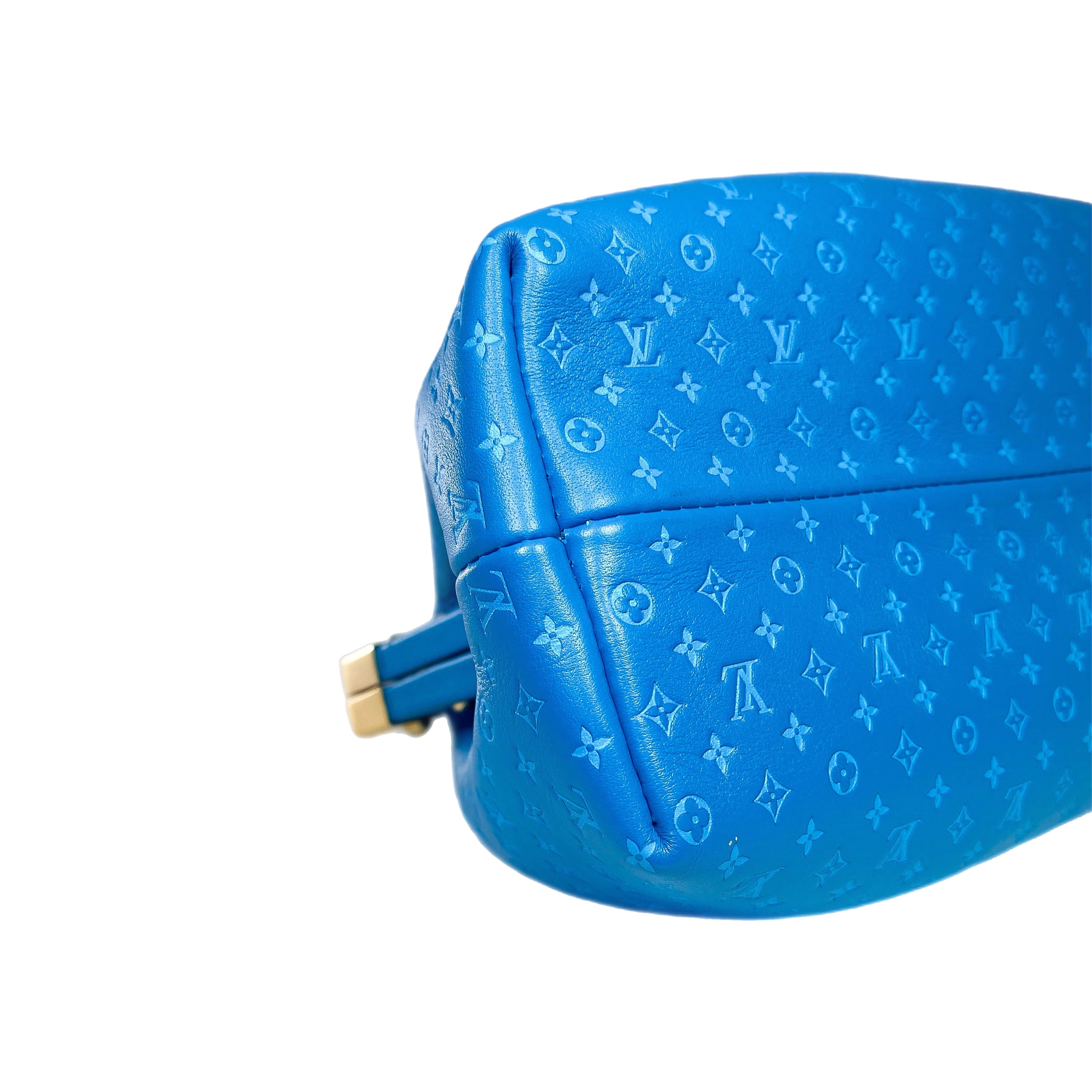 Louis Vuitton Turquoise Embossed Nanogram Clutch