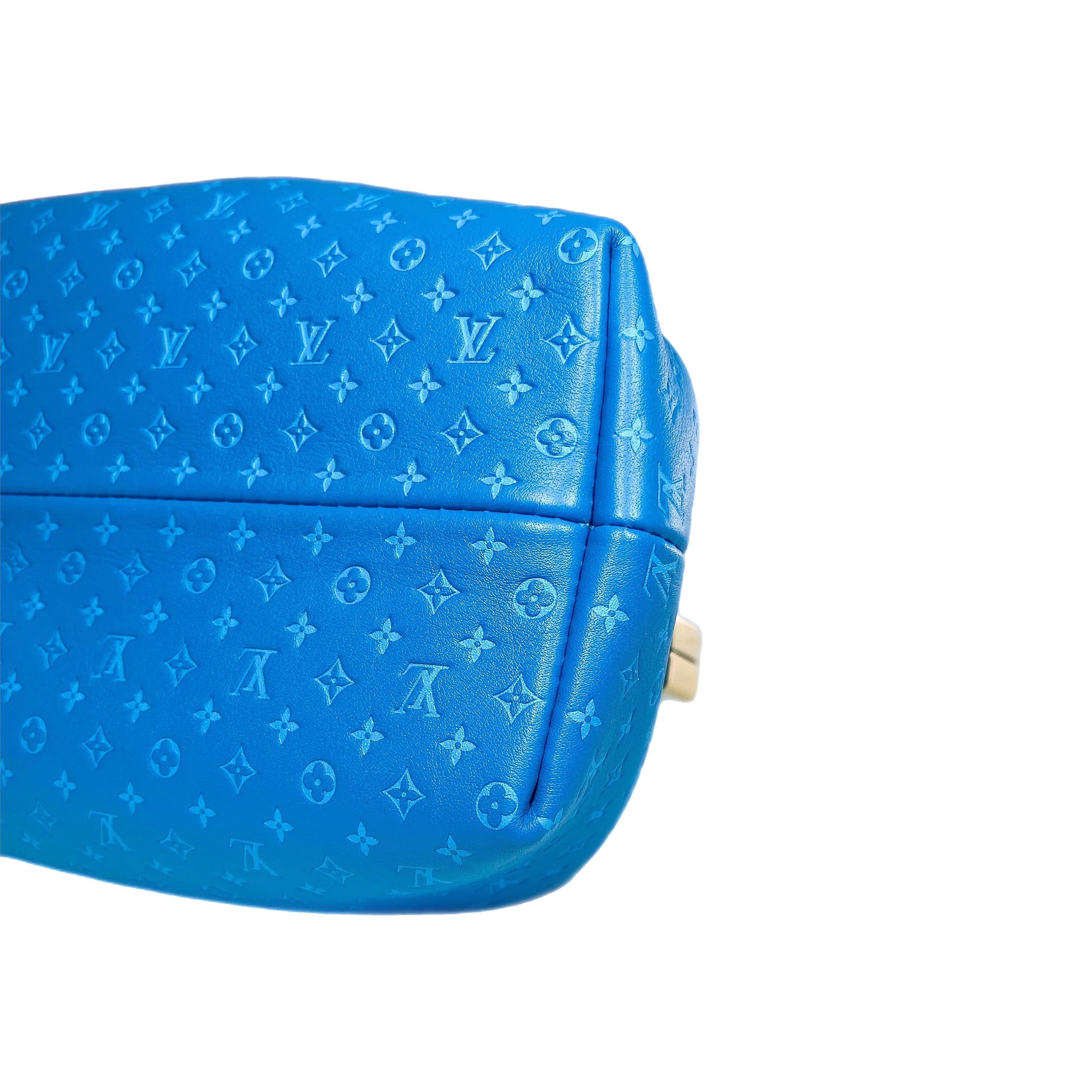 Louis Vuitton Turquoise Embossed Nanogram Clutch